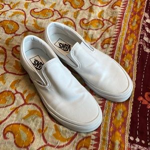 White slip on Vans
